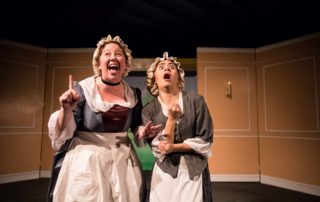 Two female servants: one excited and the other terrified.