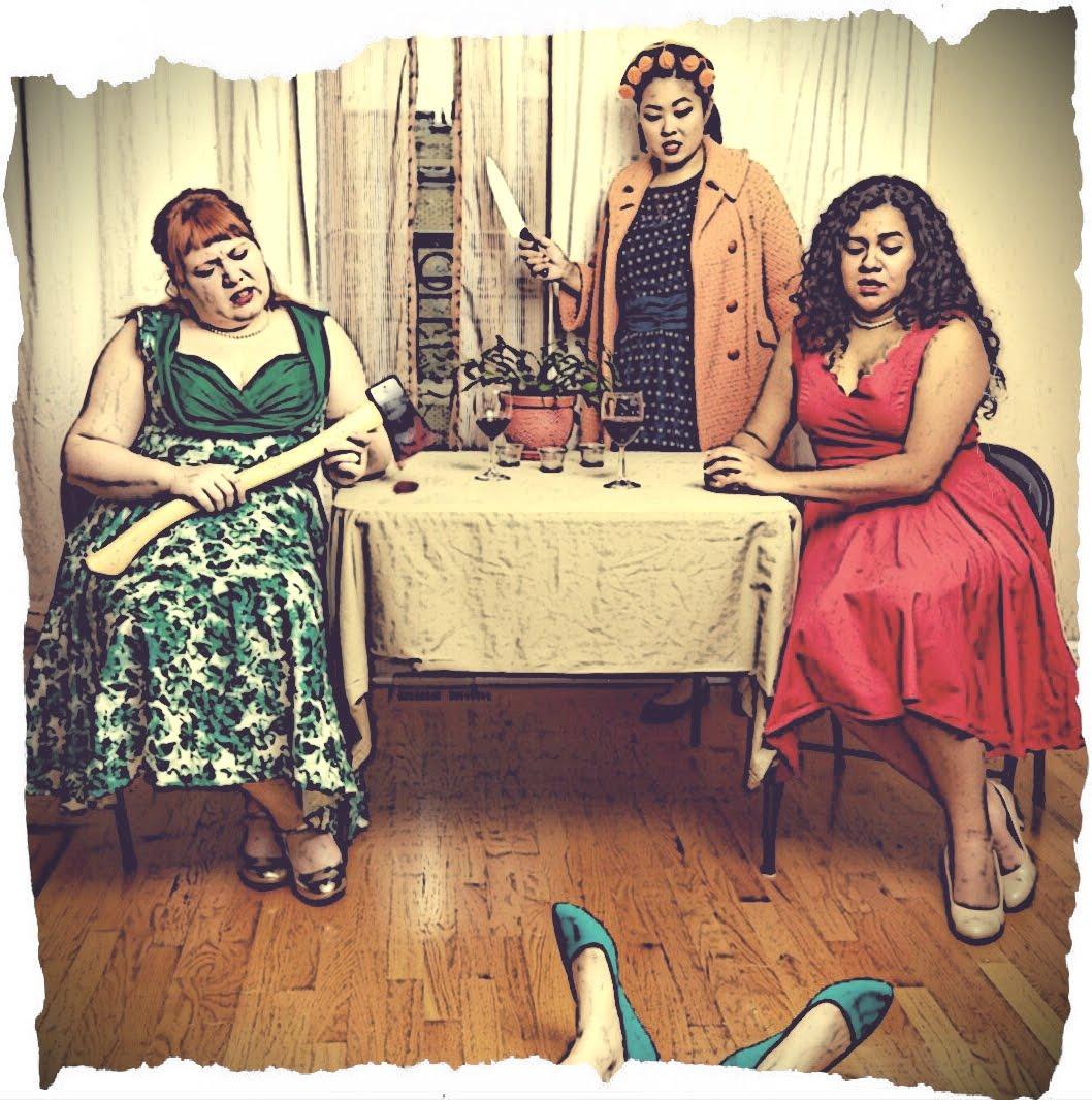 3 ladies seated around a table, one with an axe and another with a raised knife, looking down at a body on the floor in high heels.