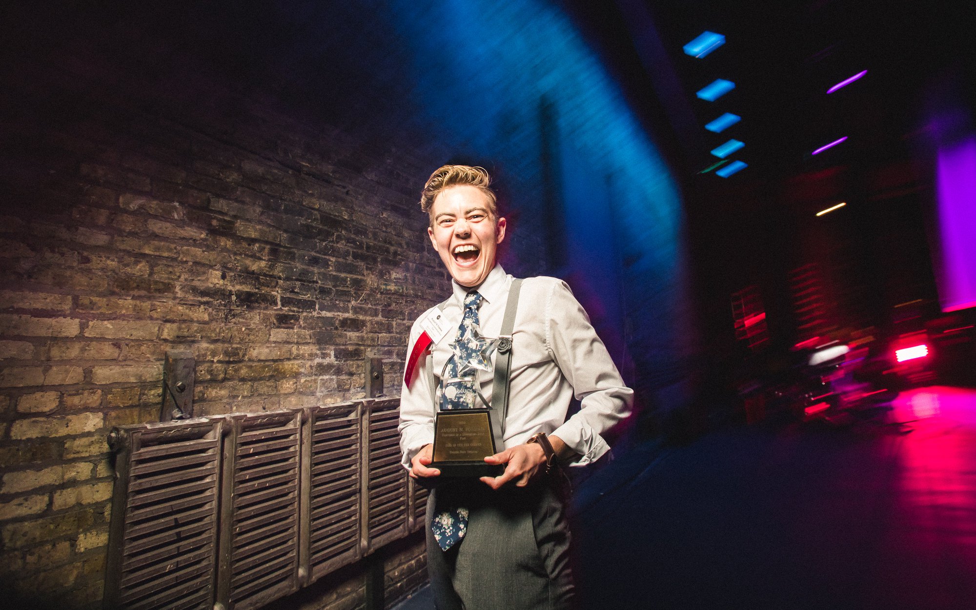 August Forman holding the 2019 Jeff Award backstage